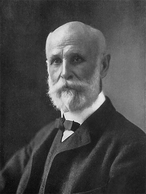 Black and white photograph of G. V. Black with a beard